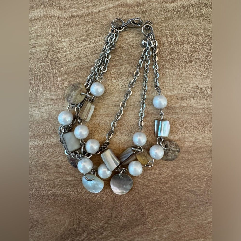 Multi-strand Mother of Pearl Bracelet Silver tone Signed (unsure of signature)